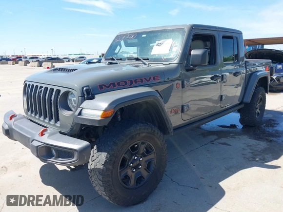 2021 Jeep Gladiator Mojave with VIN 1C6JJTEG8ML515686, listed as a IAAI auction lot 42217590 with 38,506 mi miles and . Bid and sale history available at DreamBid. Image 2.