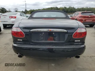 2006 Jaguar XK with VIN SAJDA42C462A44968, listed as a Copart auction lot 75758524 with 77,266 mi miles and Salvage Title. Bid and sale history available at carsss.com. Image 6.