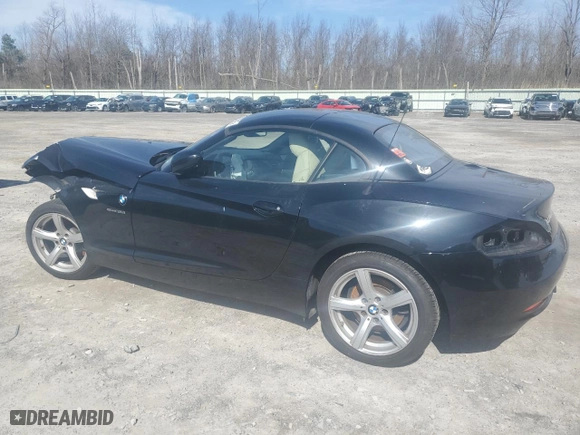 2010 BMW Z4 sDrive30i with VIN WBALM5C57AE162215, listed as a Copart auction lot 49708785 with 0 mi miles and Salvage Title. Bid and sale history available at carsss.com. Image 2.