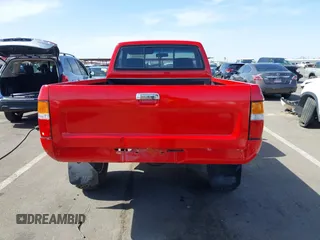 1990 Toyota Pickup DX z VIN JT4RN01P7L7019709, wystawiony jako IAAI lot #42448995 z przebiegiem 144 469 mil mil oraz . Historia ofert i sprzedaży dostępna na DreamBid. Obrazek 17.