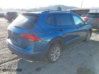 2019 Volkswagen Tiguan S with VIN 3VV0B7AX6KM067699, listed as a IAAI auction lot 41634351 with 181,093 mi miles. Bid and sale history available at carsss.com. Image 4.