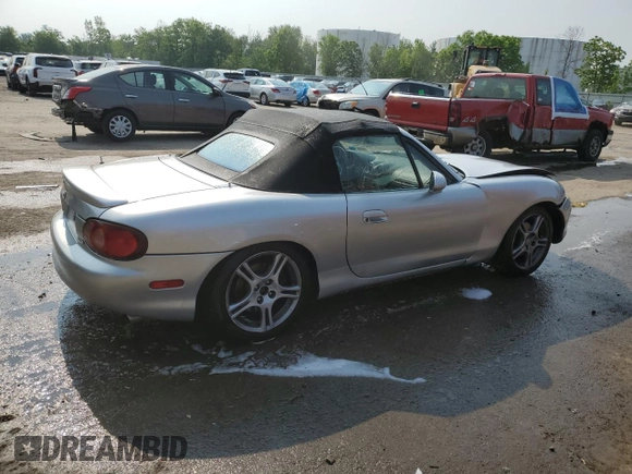 2005 Mazda MX-5 Miata LS with VIN JM1NB353X50410512, listed as a Copart auction lot 59663705 with 111,767 mi miles and Salvage title. Bid and sale history available at DreamBid. Image 3.