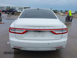 2017 Lincoln Continental Select z VIN 1LN6L9SK5H5616680, wystawiony jako IAAI lot #42465865 z przebiegiem 86 686 mil mil oraz . Historia ofert i sprzedaży dostępna na DreamBid. Obrazek 16.