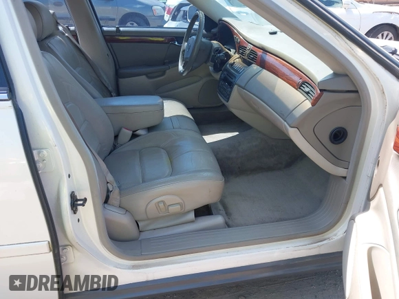 2004 Cadillac DeVille z VIN 1G6KD54Y04U156194, wystawiony jako IAAI lot #42143148 z przebiegiem 141 938 mil mil oraz . Historia ofert i sprzedaży dostępna na DreamBid. Obrazek 5.