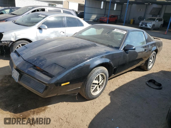 1982 Pontiac Firebird z VIN 1G2AW87H4CL566862, wystawiony jako Copart lot #74777384 z przebiegiem 597 058 mil mil oraz Czysty tytuł • Clean title. Historia ofert i sprzedaży dostępna na DreamBid. Obrazek 1.