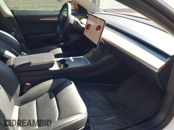 2022 Tesla Model 3 with VIN 5YJ3E1EA5NF168201, listed as a IAAI auction lot 41855273 with 31,393 mi miles and . Bid and sale history available at DreamBid. Image 5.