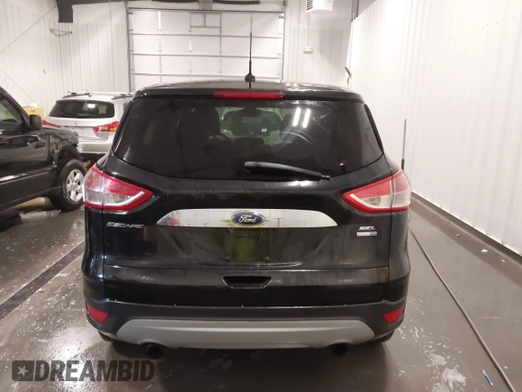 2013 Ford Escape SEL with VIN 1FMCU9H99DUD11347, listed as a IAAI auction lot 41758824 with 154,339 mi miles. Bid and sale history available at carsss.com. Image 16.