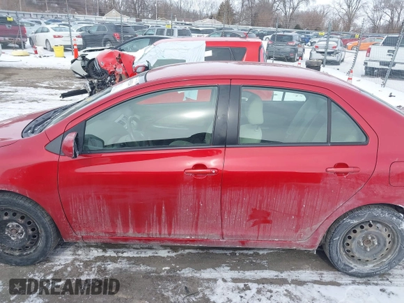 2009 Toyota Yaris with VIN JTDBT903991314767, listed as a IAAI auction lot 41615264 with 252,957 mi miles. Bid and sale history available at carsss.com. Image 14.