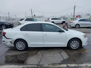 2016 Volkswagen Jetta Sedan 1.4T S w/Technology with VIN 3VW267AJ6GM237619, listed as a IAAI auction lot 41878297 with 124,887 mi miles. Bid and sale history available at carsss.com. Image 13.