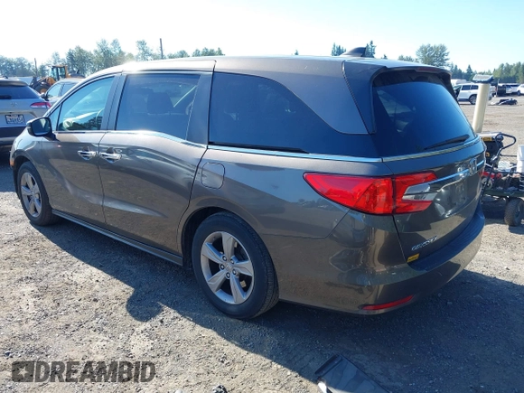 2018 Honda Odyssey EX with VIN 5FNRL6H5XJB100482, listed as a IAAI auction lot 42616266 with 82,953 mi miles and . Bid and sale history available at DreamBid. Image 3.