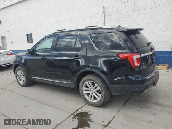 2018 Ford Explorer XLT with VIN 1FM5K8D84JGB94843, listed as a Copart auction lot 55755645 with 104,709 mi miles and Salvage title. Bid and sale history available at DreamBid. Image 2.