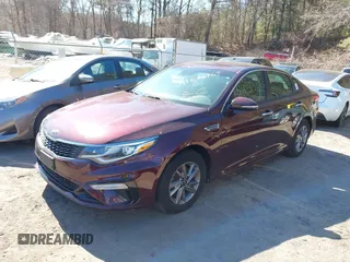 2020 Kia Optima LX with VIN 5XXGT4L38LG393235, listed as a IAAI auction lot 41676769 with 133,312 mi miles and . Bid and sale history available at carsss.com. Image 2.