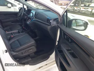 2021 Honda Odyssey Touring z VIN 5FNRL6H80MB003323, wystawiony jako IAAI lot #42303968 z przebiegiem 51 531 mil mil oraz . Historia ofert i sprzedaży dostępna na DreamBid. Obrazek 5.