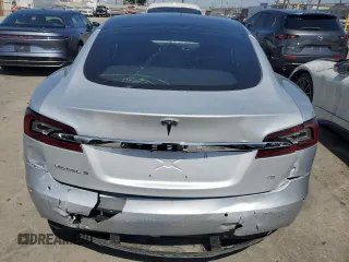 2017 Tesla Model S 60 with VIN 5YJSA1E17HF189627, listed as a Copart auction lot 64454635 with 106,003 mi miles and Salvage title. Bid and sale history available at DreamBid. Image 6.