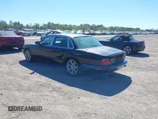 2000 Jaguar XJ with VIN SAJDA15B2YMF14634, listed as a IAAI auction lot 41827953 with 111,505 mi miles and . Bid and sale history available at DreamBid. Image 3.