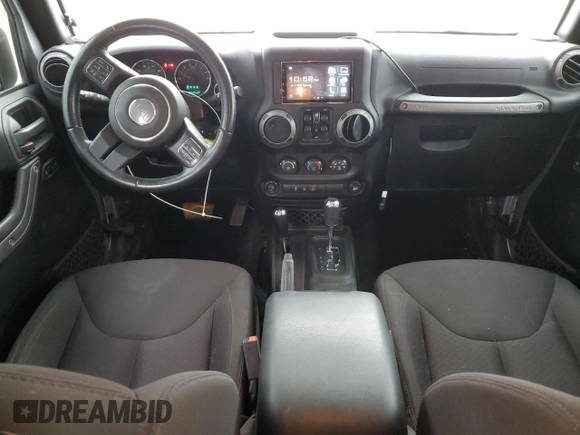 2015 Jeep Wrangler Unlimited Willys Wheeler with VIN 1C4BJWDG4FL723924, listed as a Copart auction lot 47145245 with 166,256 mi miles and Salvage Title. Bid and sale history available at DreamBid. Image 8.