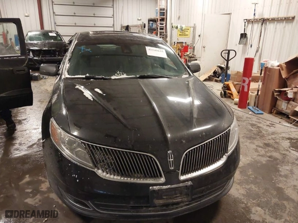 2013 Lincoln MKS EcoBoost with VIN 1LNHL9FT1DG614189, listed as a IAAI auction lot 41549635 with 180043 miles. Bid and sale history available at carsss.com. Image 12.