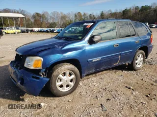 2005 GMC Envoy SLE with VIN 1GKDS13S352369384, listed as a Copart auction lot 79996394 with 117,697 mi miles and Salvage Title. Bid and sale history available at carsss.com. Image 1.