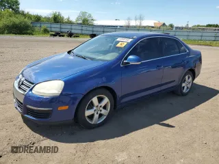 2009 Volkswagen Jetta SE with VIN 3VWRM71K49M149782, listed as a Copart auction lot 58998155 with 199,981 mi miles and Salvage title. Bid and sale history available at DreamBid. Image 1.