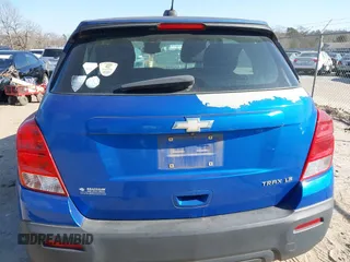 2015 Chevrolet Trax LS with VIN KL7CJKSB4FB086024, listed as a IAAI auction lot 41669572 with 124,312 mi miles. Bid and sale history available at carsss.com. Image 12.