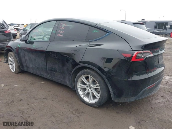 2021 Tesla Model Y Standard Range with VIN 5YJYGDED5MF110941, listed as a IAAI auction lot 41538640 with 50,847 mi miles. Bid and sale history available at carsss.com. Image 3.