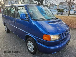 1999 Volkswagen EuroVan с VIN WV2MH2703XH035849, выставлен на аукционе Copart как лот 41776025 с пробегом 261 952 миль миль и Чистый • Clean title. История ставок и продаж доступна на DreamBid. Изображение 1.