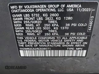 2024 Volkswagen Atlas SE with VIN 1V2WR2CA2RC536071, listed as a IAAI auction lot 42087700 with 38,879 mi miles and . Bid and sale history available at DreamBid. Image 9.