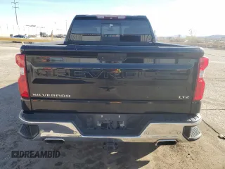 2019 Chevrolet Silverado 1500 LTZ with VIN 3GCUYGEL2KG182725, listed as a Copart auction lot 50393705 with 135,057 mi miles and Salvage Title. Bid and sale history available at DreamBid. Image 6.