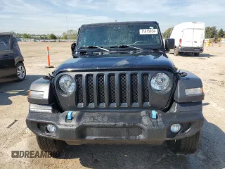 2023 Jeep Wrangler Sport with VIN 1C4HJXAG3PW618988, listed as a Copart auction lot 71615934 with 34,342 mi miles and Salvage title. Bid and sale history available at DreamBid. Image 5.