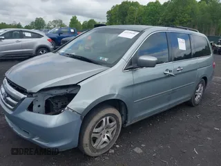 2006 Honda Odyssey EX z VIN 5FNRL38456B129594, wystawiony jako IAAI lot #42279156 z przebiegiem Nie podano mil oraz . Historia ofert i sprzedaży dostępna na DreamBid. Obrazek 2.