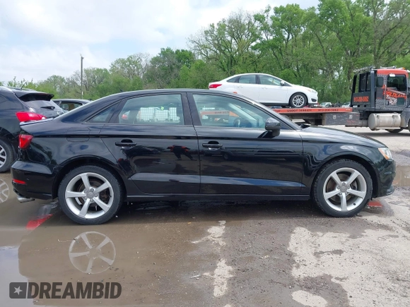 2015 Audi A3 Premium z VIN WAUBFGFF6F1009748, wystawiony jako IAAI lot #42123621 z przebiegiem 158 290 mil mil oraz . Historia ofert i sprzedaży dostępna na DreamBid. Obrazek 13.