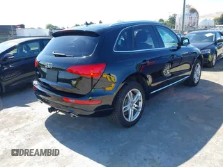 2014 Audi Q5 Premium Plus z VIN WA1CMAFP8EA041094, wystawiony jako IAAI lot #42316641 z przebiegiem 86 322 mil mil oraz . Historia ofert i sprzedaży dostępna na DreamBid. Obrazek 4.
