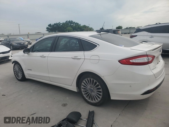 2013 Ford Fusion Titanium Hybrid с VIN 3FA6P0RU3DR282013, выставлен на аукционе Copart как лот 53651595 с пробегом 133 214 миль миль и Списание • Salvage title. История ставок и продаж доступна на DreamBid. Изображение 2.