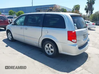 2012 Dodge Grand Caravan SXT with VIN 2C4RDGCG2CR223891, listed as a IAAI auction lot 42189650 with 119,669 mi miles and . Bid and sale history available at DreamBid. Image 3.