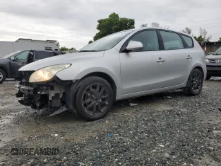 2009 Hyundai Elantra Touring z VIN KMHDC86E59U034530, wystawiony jako Copart lot #59364635 z przebiegiem 141 301 mil mil oraz Szkoda całkowita • Salvage title. Historia ofert i sprzedaży dostępna na DreamBid. Obrazek 1.