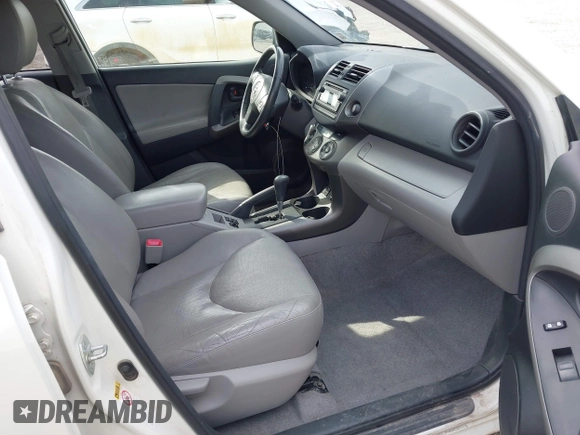 2012 Toyota RAV4 Limited z VIN JTMDF4DV5C5058092, wystawiony jako IAAI lot #42322172 z przebiegiem 216 601 mil mil oraz . Historia ofert i sprzedaży dostępna na DreamBid. Obrazek 5.