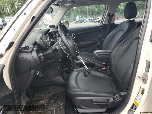 2017 MINI Hardtop 4 Door Cooper with VIN WMWXU1C53H2E18584, listed as a Copart auction lot 61355915 with 56,171 mi miles and Salvage title. Bid and sale history available at DreamBid. Image 7.