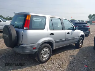 2001 Honda CR-V LX z VIN JHLRD28411C002079, wystawiony jako IAAI lot #42489320 z przebiegiem 178 195 mil mil oraz . Historia ofert i sprzedaży dostępna na DreamBid. Obrazek 6.