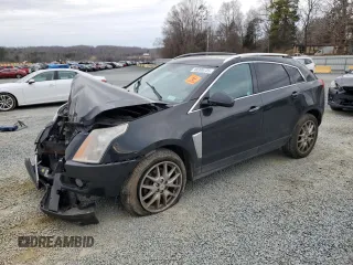 2014 Cadillac SRX Premium Collection z VIN 3GYFNGE3XES577569, wystawiony jako Copart lot #48399735 z przebiegiem Nie podano mil oraz Szkody całkowita. Historia ofert i sprzedaży dostępna na DreamBid. Obrazek 1.