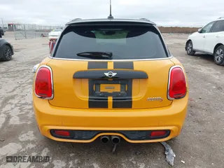 2016 MINI Cooper Hardtop 4 Door S with VIN WMWXU3C58G2B63277, listed as a IAAI auction lot 41566817 with 98,195 mi miles. Bid and sale history available at carsss.com. Image 16.