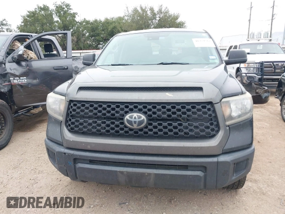 2019 Toyota Tundra SR with VIN 5TFRM5F1XKX143105, listed as a IAAI auction lot 41274567 with 180,602 mi miles and . Bid and sale history available at DreamBid. Image 13.