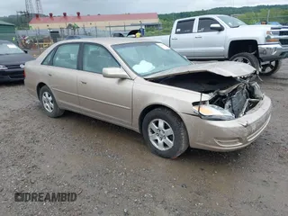 2001 Toyota Avalon XL z VIN 4T1BF28B21U190012, wystawiony jako IAAI lot #42320551 z przebiegiem 122 412 mil mil oraz . Historia ofert i sprzedaży dostępna na DreamBid. Obrazek 1.