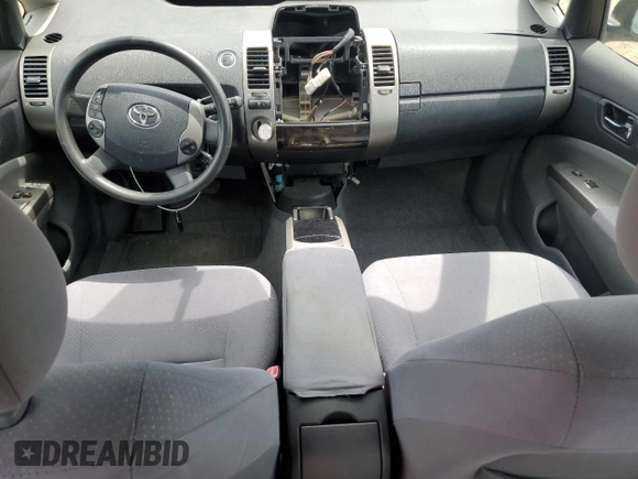 2007 Toyota Prius z VIN JTDKB20U377090358, wystawiony jako Copart lot #56599325 z przebiegiem 152 754 mil mil oraz Szkoda całkowita • Salvage title. Historia ofert i sprzedaży dostępna na DreamBid. Obrazek 8.