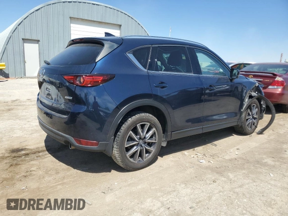 2018 Mazda CX-5 Grand Touring with VIN JM3KFADM7J0377315, listed as a Copart auction lot 53335185 with 68,462 mi miles and Salvage title. Bid and sale history available at DreamBid. Image 3.