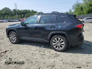 2023 Toyota RAV4 XLE Premium with VIN 2T3A1RFV0PC383809, listed as a Copart auction lot 59938405 with 33,206 mi miles and Salvage title. Bid and sale history available at DreamBid. Image 2.