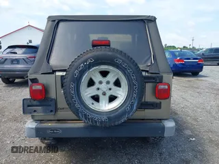 2004 Jeep Wrangler Sport with VIN 1J4FA49SX4P774167, listed as a IAAI auction lot 42686834 with 170,731 mi miles and . Bid and sale history available at DreamBid. Image 16.
