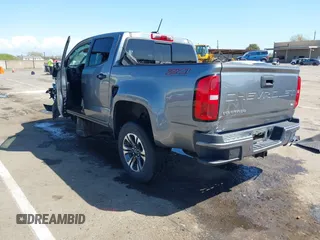 2021 Chevrolet Colorado 4WD Z71 with VIN 1GCGTDEN9M1249916, listed as a IAAI auction lot 41947042 with 26,842 mi miles. Bid and sale history available at carsss.com. Image 3.