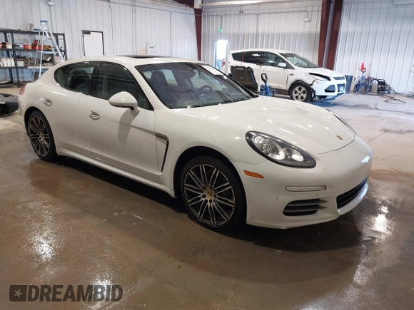 2016 Porsche Panamera 4 z VIN WP0AA2A71GL000087, wystawiony jako IAAI lot #41435476 z przebiegiem 103 537 mil mil oraz . Historia ofert i sprzedaży dostępna na DreamBid. Obrazek 1.