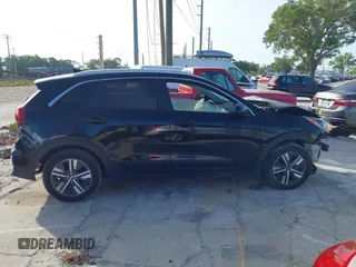 2020 Kia Niro LXS with VIN KNDCB3LC2L5422695, listed as a IAAI auction lot 41881263 with 77,197 mi miles. Bid and sale history available at carsss.com. Image 12.