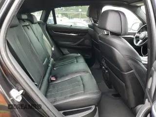 2017 BMW X6 xDrive35i z VIN 5UXKU2C39H0X47816, wystawiony jako Copart lot #53553385 z przebiegiem 123 036 mil mil oraz Szkoda całkowita • Salvage title. Historia ofert i sprzedaży dostępna na DreamBid. Obrazek 11.